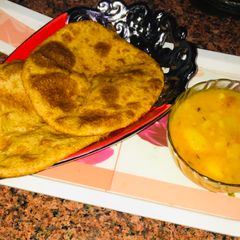 Potato puri with potato curry A picture of Potato puri with potato curry.