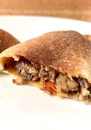 Una foto de Empanadas caseras de champiñones y tikka masala