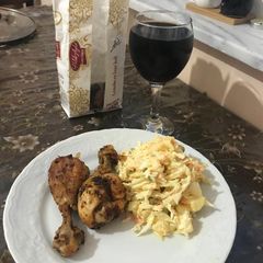 A picture of Cole slaw and friend chicken.