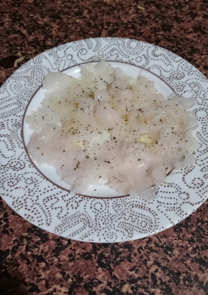 Una foto de Carpaccio de Merluza