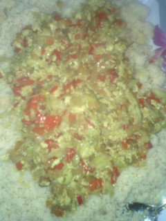 A picture of Couscous wit egg sauce.