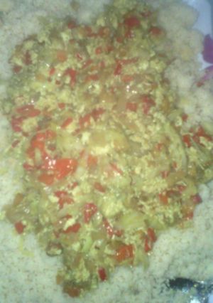 A picture of Couscous wit egg sauce.