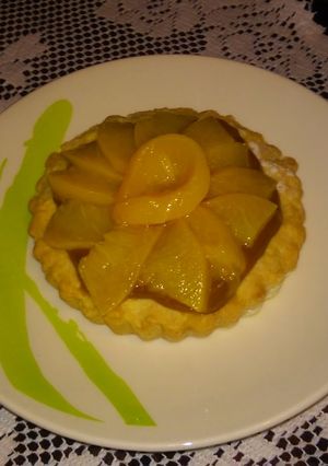 Una foto de Tarteleta de dulce de leche y duraznos