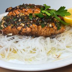 A picture of Honey Garlic Salmon with Rice Noodles.