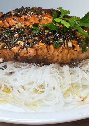 A picture of Honey Garlic Salmon with Rice Noodles.