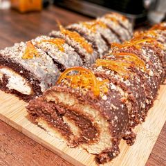 A picture of Roll with chocolate icing.