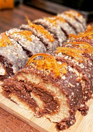A picture of Roll with chocolate icing.