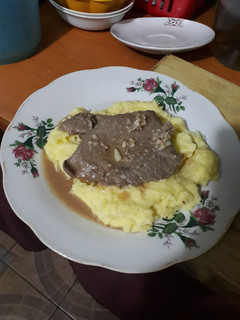 Una foto de Puré con bistec