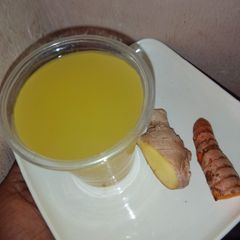A picture of Tumeric and ginger drink.