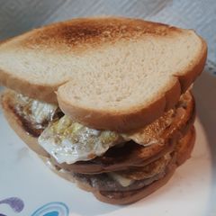 A picture of Peppered Beef, Eggs, and Cheese Sandwich.