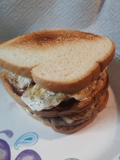 A picture of Peppered Beef, Eggs, and Cheese Sandwich.