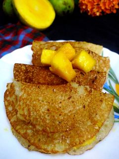 ম্যাঙ্গো স্টাফিং প্যানকেক(mango stuffing pancake recipe in Bengali) রেসিপির প্রধান ছবি