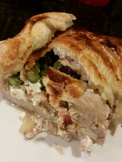 A picture of Brad's bacon asparagus and cream cheese stuffed pork wellington.