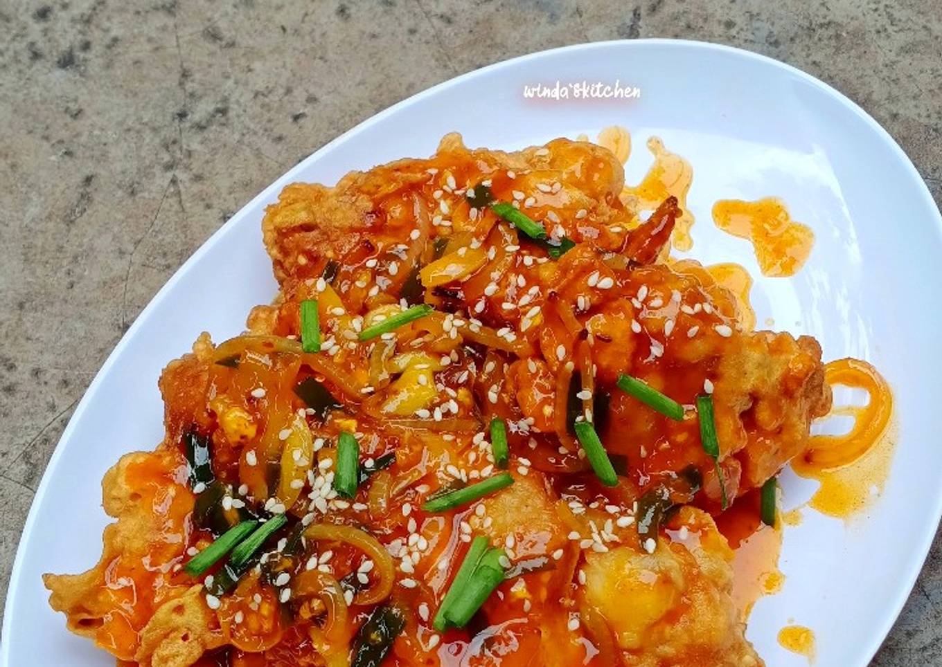 Ayam goreng wijen with hot lava sauce