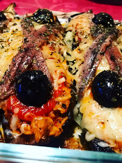 Una foto de Berenjenas rellenas de atún a la siciliana