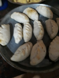 Una foto de Empanadas de carne de cerdo picada🙄🤩😎👌