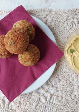Foto di Mini Arancini di recupero con cuore filante