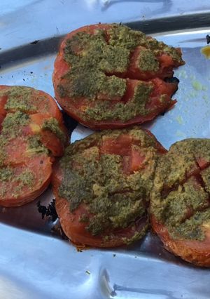 Une photo de Tomates aux herbes,ail et parmesan