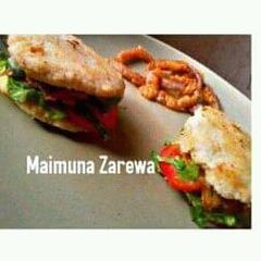 A picture of Yam burger and onion ring.