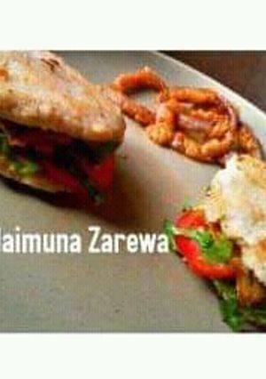 A picture of Yam burger and onion ring.