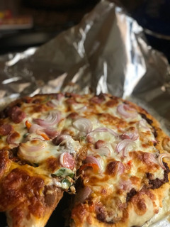 A picture of Minced meat pizza 🍕🤫.