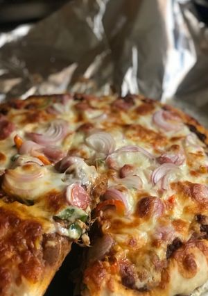 A picture of Minced meat pizza 🍕🤫.