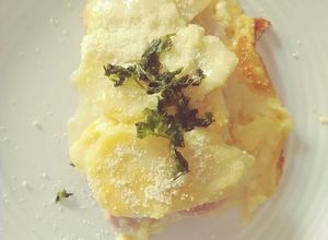 Una foto de Papas gratinadas con jamón