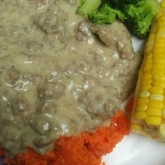A picture of Smashed Carrots and Gravy A Complete Dinner.