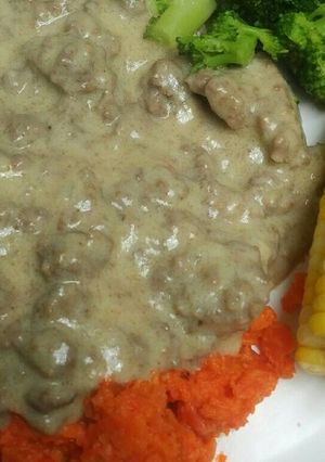 A picture of Smashed Carrots and Gravy A Complete Dinner.