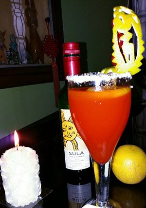 A picture of Orange pomegranate martinis 😍😍.
