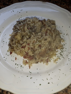 Una foto de Arroz con setas y jamón serrano
