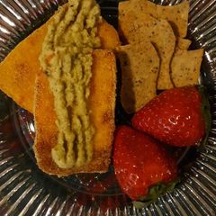 A picture of Oven baked paneer topped with chutney or fruit jam.