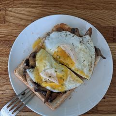 A picture of Mushrooms and egg brunch.