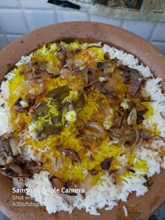 A picture of Pot Egg dum biryani.