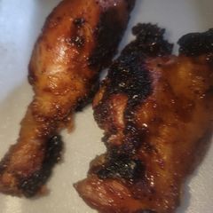 A picture of BBQ Chicken on the Grill.