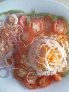 A picture of Mashed potatoes,arrowroot and vegetable salad.