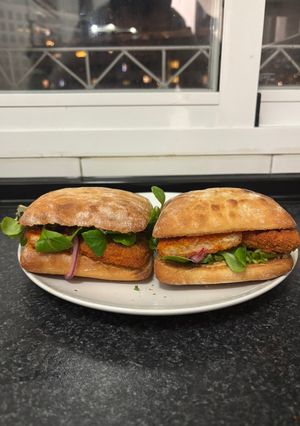 A picture of Crispy Chicken Sandwich with Pickled Red Onion and Sriracha Mayo.