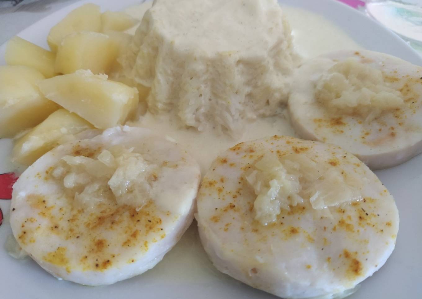 Merluza con arroz al curry