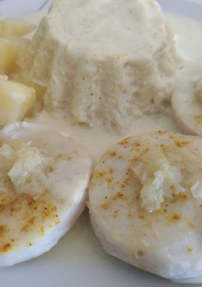 Una foto de Merluza con arroz al curry