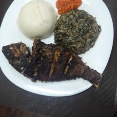 A picture of Mchicha in groundnuts,ugali n fried fish #authorsmarathon.