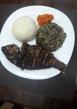 A picture of Mchicha in groundnuts,ugali n fried fish #authorsmarathon.