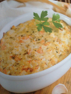 Una foto de Pastel de merluza con gambas