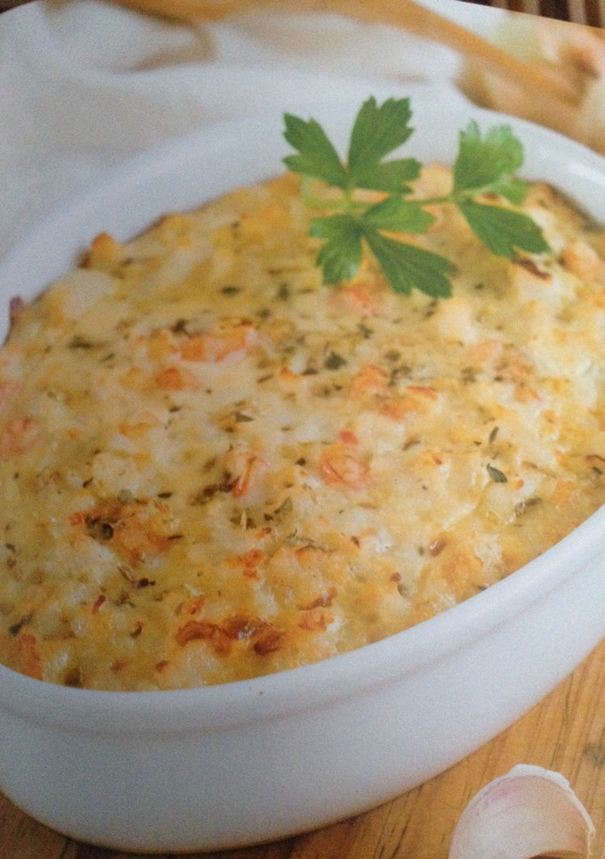 Una foto de Pastel de merluza con gambas