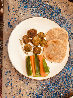 A picture of The forever best canned chickpea falafel with yoghurt sauce and GF flatbread.
