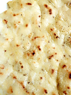 A picture of 3 Spice Rice Roti.