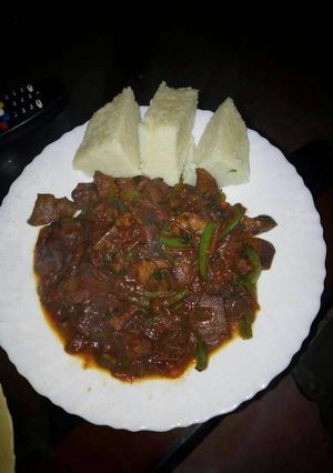 A picture of Liver stew and ugali.