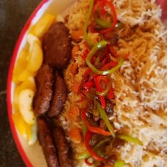 A picture of Kachay qeemay K kebab with masala rice 😍.