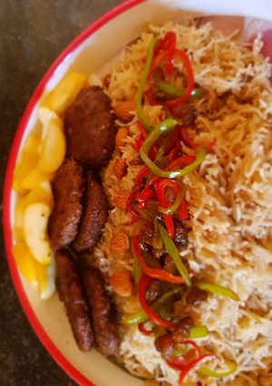 A picture of Kachay qeemay K kebab with masala rice 😍.