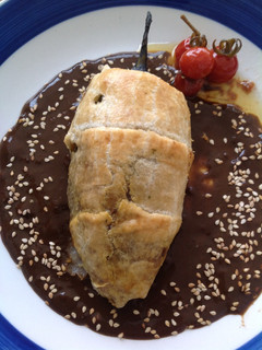 Una foto de Chile poblano en gabardina