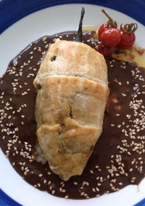 Una foto de Chile poblano en gabardina